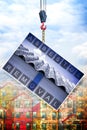 Asbestos removal concept image with crane and buildings. Royalty Free Stock Photo