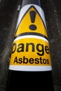 Asbestos warning sign on building