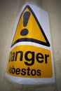 Asbestos warning sign on building