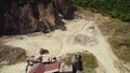 ascending view of bricks small warehouse in the nonurban area, aerial shot