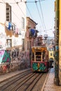 Ascensor da Bica, Tram / Funicular with graffiti in Lisbon, Portugal Royalty Free Stock Photo