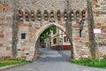 Aschaffenburg, Germany - Gate in city wall attached to `Schloss Johannisburg` castle in historic city of Aschaffenburg