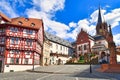 Aschaffenburg, Germany - July 2020: Town suqre with catholic curch `Kollegiatsstift St. Peter und Alexander` or `Stiftskirche