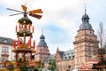 Aschaffenburg, Germany - November 30, 2019: Christmas pyramid on the advent market at the famous Castle Johannisburg in