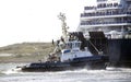 An asd powered tugboat assisting a ferry