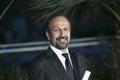 Asghar Farhadi poses with his award for the Best Screenplay Royalty Free Stock Photo