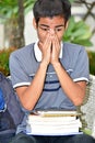Ashamed Young Boy Student With Notebooks