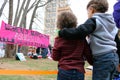 Asheville NC Women March Banner with children Hugging