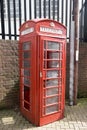 Ashford, Kent, United Kingdom - March 9, 2020: Broken red phone box in Ashford town centre