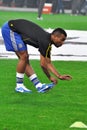 Ashley Cole stretches to warm up Royalty Free Stock Photo