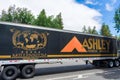 Ashley Furniture Industries truck is delivering products to customers