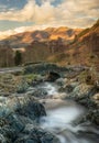 Ashness Bridge evening with golden light over Skiddaw Royalty Free Stock Photo