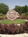 Ashok chakra replica made by stone in garden