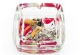 Ashtray with cigarette butts, isolated on white Royalty Free Stock Photo