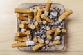 Ashtray full of cigarette butts Royalty Free Stock Photo