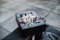 Ashtray full of cigarettes