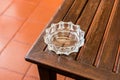 Ashtray on wood table Royalty Free Stock Photo