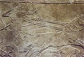 Ashurnasirpal hunting lions from chariot. Nimrud Palace stone reliefs Royalty Free Stock Photo