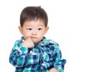 Asia baby boy suck finger into mouth Royalty Free Stock Photo