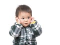 Asia baby boy touch his ear Royalty Free Stock Photo