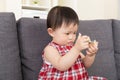 Asia baby girl concentrate on playing toy block Royalty Free Stock Photo