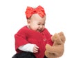 Asia baby girl play doll bear Royalty Free Stock Photo