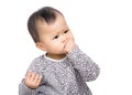 Asia baby girl suck finger into mouth Royalty Free Stock Photo