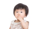 Asia baby girl suck finger into mouth Royalty Free Stock Photo