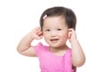 Asia baby girl touch her ear Royalty Free Stock Photo