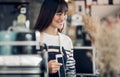 Asia Barista waiter use tablet take order from customer in coffee shop,cafe owner at counter bar,Food and drink business concept, Royalty Free Stock Photo