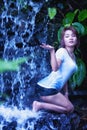 Asia Beautiful girl at waterfall Royalty Free Stock Photo