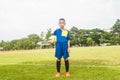 Asia boy playing Soccer football field stadium grass line ball b Royalty Free Stock Photo