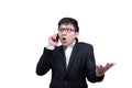 Asia businessman has holding a phone for seriuosly talking with Royalty Free Stock Photo