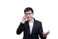 Asia businessman has holding a phone for seriuosly talking with Royalty Free Stock Photo