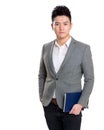 Asia businessman holding notebook