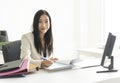 Asia businesswoman working at desk in her office