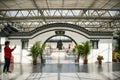 Asia China, Beijing, agricultural carnival,Indoor exhibition hall, sceneÃ¯Â¼ÅRound door, white wall, grey tile, flower window