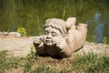 Asia China, Beijing, Yang Shan Park, landscape sculpture, the child lying on the grass