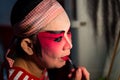 Teochew Opera. Artiste putting on makeup. Traditional heritage arts