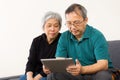 Asia couple using tablet Royalty Free Stock Photo