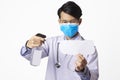 Asia doctor using spray alcohol cleaning mockup paper for protect anti virus bacteria