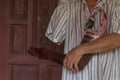 Asia elderly man with one arm and arm prosthetic