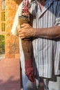 Asia elderly man with one arm and arm prosthetic