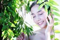 Asia face woman with fresh health skin posing on nature.