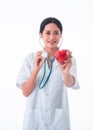 Asia Female Doctor, with stethoscope holding red heart isolated on white background. Royalty Free Stock Photo