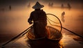 Asia fisherman net using on wooden boat casting net sunset or sunrise in the Mekong river - Silhouette fisherman boat Royalty Free Stock Photo