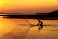 Asia Fishermen are casting nets for fishing.