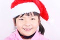 Asia girl with Christmas hat Royalty Free Stock Photo