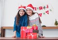 Asia girl friends wear santa hat in Christmas and new year party Royalty Free Stock Photo