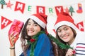 Asia girl friends wear santa hat in Christmas and new year party Royalty Free Stock Photo